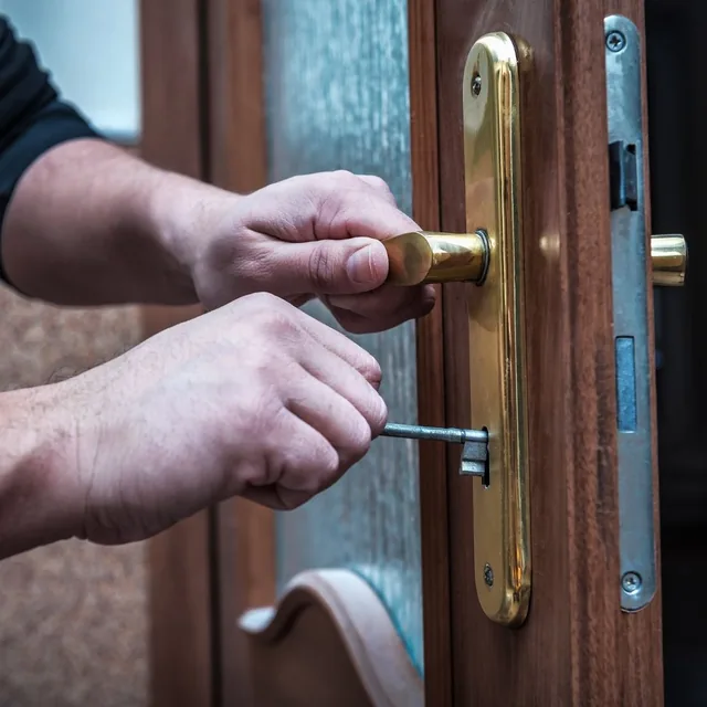 Testing a new key in a front door lock after a rekeying service in Montgomery, AL Testing a new key in a front door lock after a rekeying service in Montgomery, AL